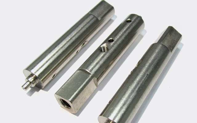 Custom CNC turned stainless steel shaft components for automation machinery