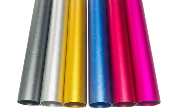 Powder coated precision machined parts with uniform matte and gloss finishes