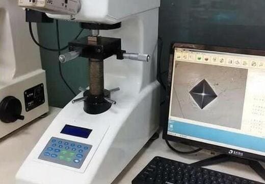 Hardness tester verifying heat treated and machined metal component hardness